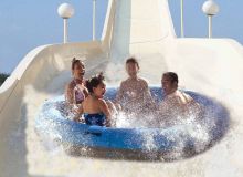 The Bubba Tub ride inside Wet and wild water park in orlando. Orlando Group getaways offers group discount tickets to Wet and wild orlando.