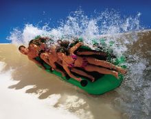TheFlyer ride inside Wet and wild water park in orlando.  Discount tickets for wet ’n wild for your groupare available with orlando group getaways.