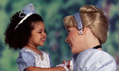 Cinderella greets a guest at the Toontown Hall of Fame Tent at the Magic Kingdom.