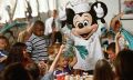Mickey Mouse at a Disney character breakfast. Disney characters can be found breakfast, lunch or dinner.