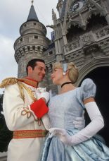 Cinderella and her prince outside Cinderellas castle inside Magic Kingdom.