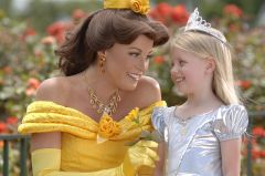 Belle and guest at the Magic Kingdom theme park. Meet and Greets available to meet disney characters.